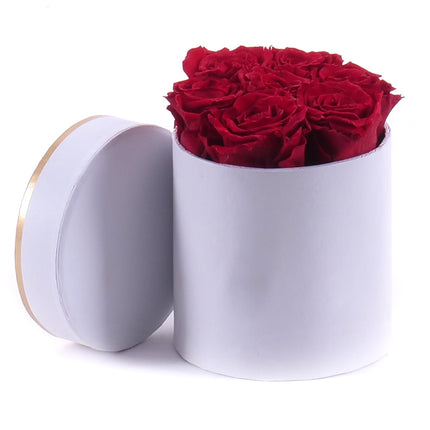 In eterno biely okrúhly box 7 červených ruží