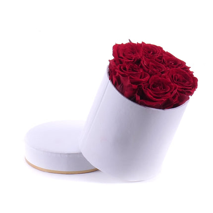 In eterno biely okrúhly box 7 červených ruží