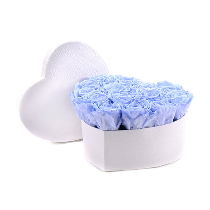 In eterno bílé srdce "M" 14 modrých růží