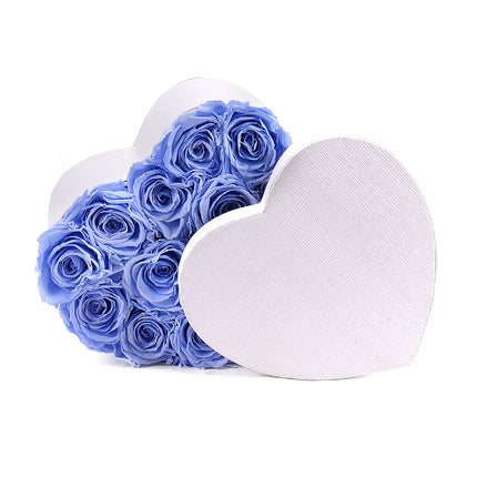 In eterno bílé srdce "M" 14 modrých růží